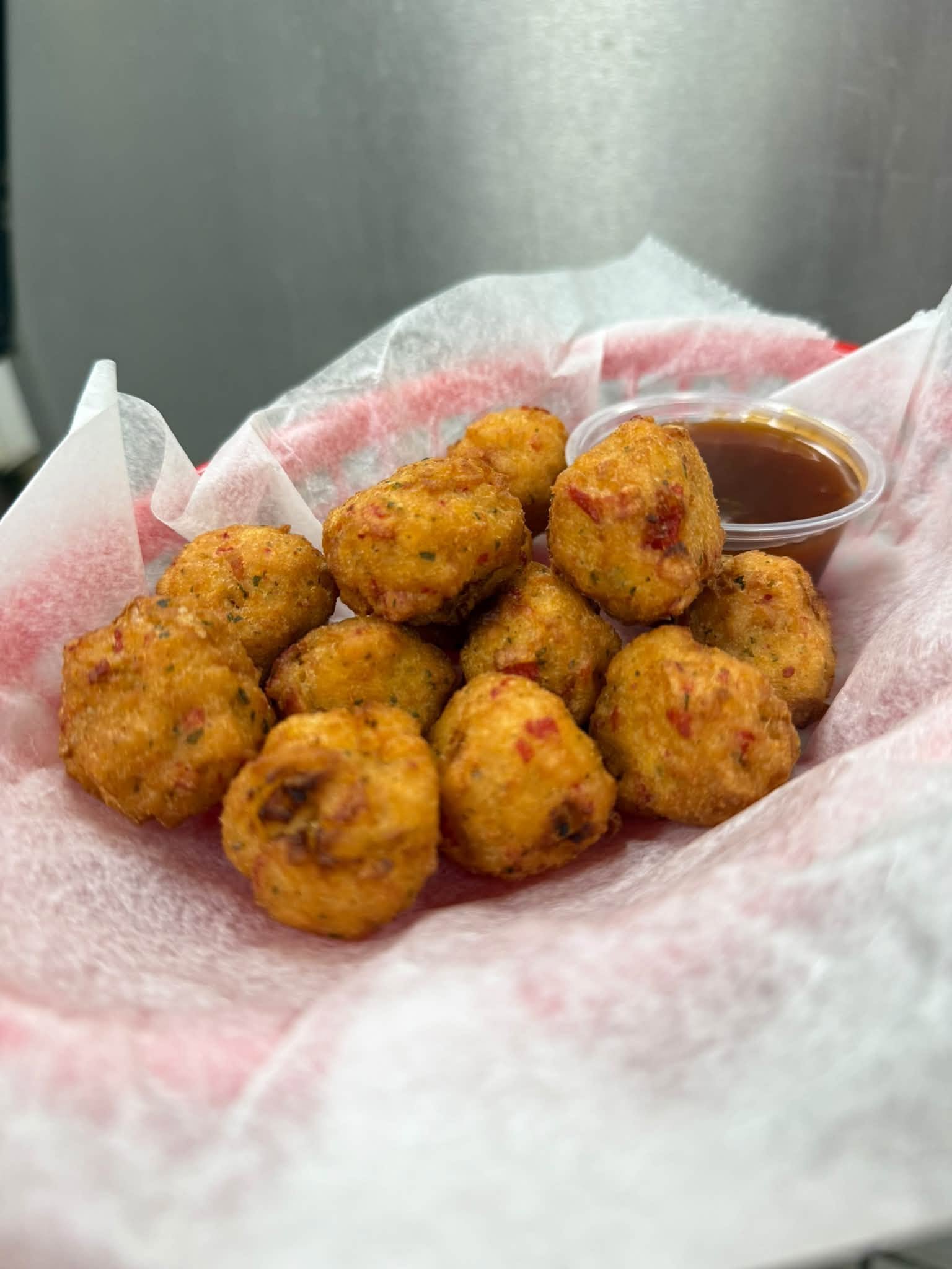 Fresh hushpuppies with dipping sauce